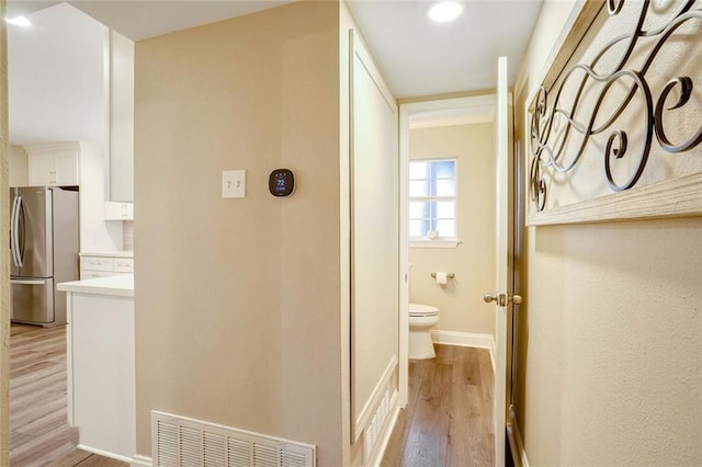 hall featuring light wood-type flooring