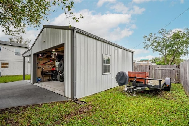 view of outdoor structure featuring a yard