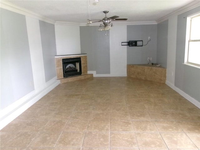6919 Virgilian St, New Orleans, LA 70126 - unfurnished living room featuring tile patterned floors, a tile fireplace, ornamental molding, and ceiling fan