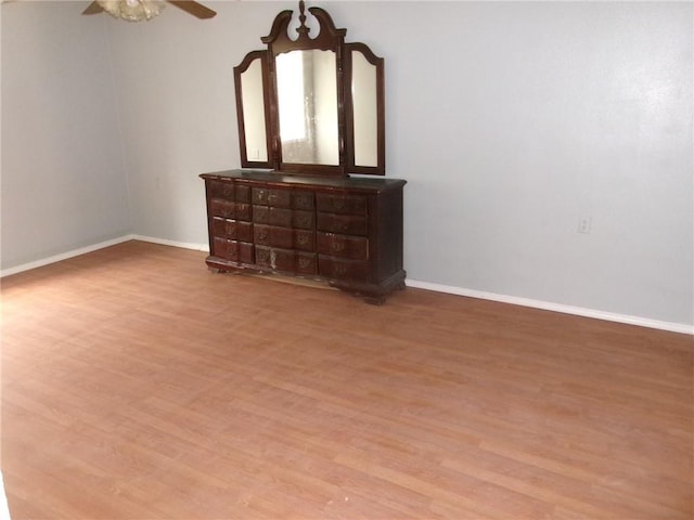 6919 Virgilian St, New Orleans, LA 70126 - bedroom with wood finished floors, baseboards, and a ceiling fan