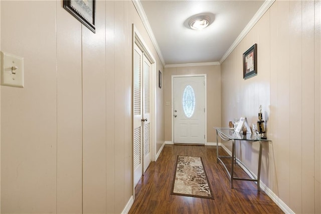 doorway featuring wooden walls, dark hardwood / wood-style floors, and ornamental molding