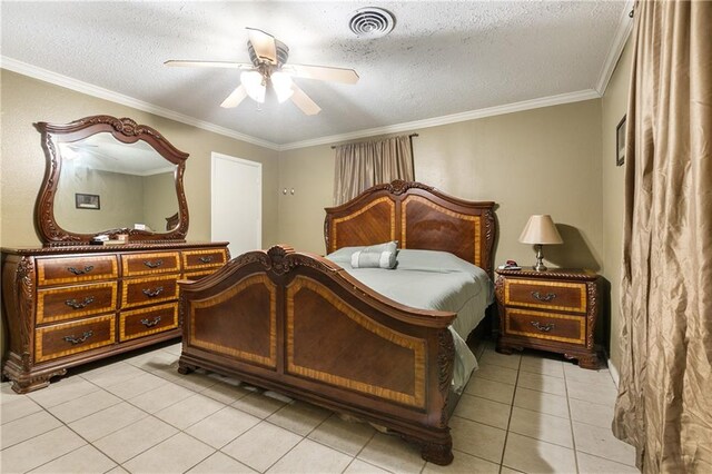 tiled bedroom featuring a textured ceiling, ceiling fan, and crown molding