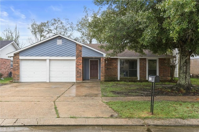 ranch-style house featuring a garage