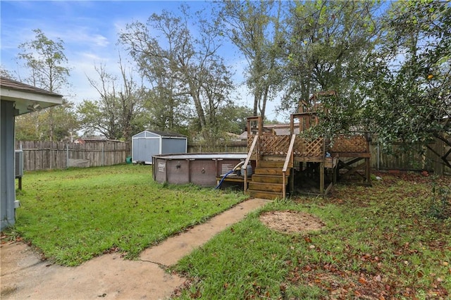 view of yard featuring a swimming pool side deck, cooling unit, and a shed