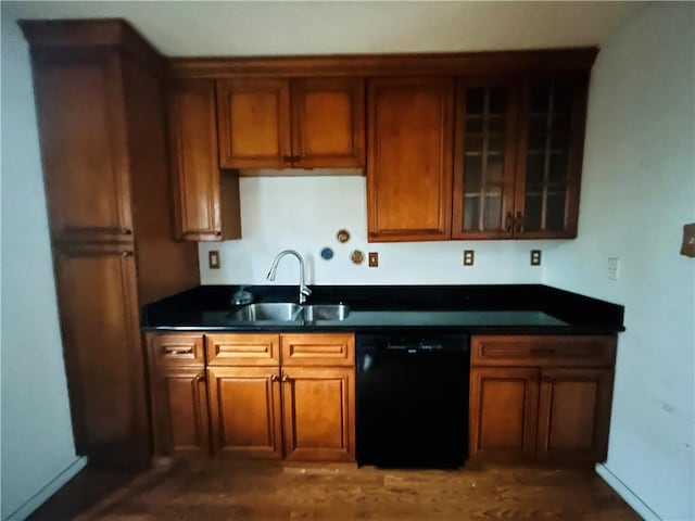 kitchen featuring dishwasher and sink