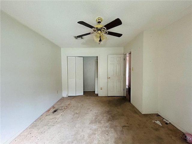 unfurnished bedroom featuring ceiling fan