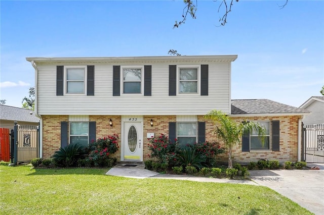 view of front facade featuring a front yard