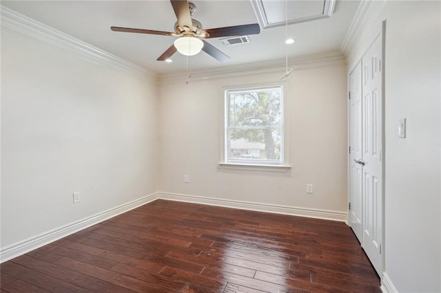 unfurnished room with crown molding, ceiling fan, and dark wood-type flooring