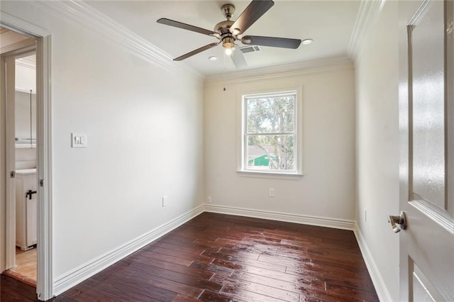 empty room with ceiling fan, ornamental molding, and dark wood-type flooring