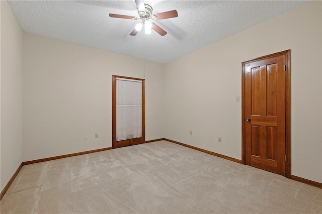 1391 E Ashton Ct, Slidell, LA 70460 - empty room featuring light carpet, ceiling fan, a textured ceiling, and baseboards