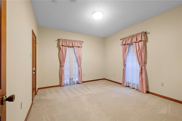 1391 E Ashton Ct, Slidell, LA 70460 - carpeted empty room featuring a textured ceiling and baseboards