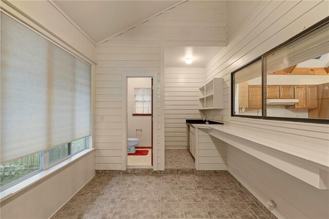 1391 E Ashton Ct, Slidell, LA 70460 - interior space with lofted ceiling and tile patterned floors