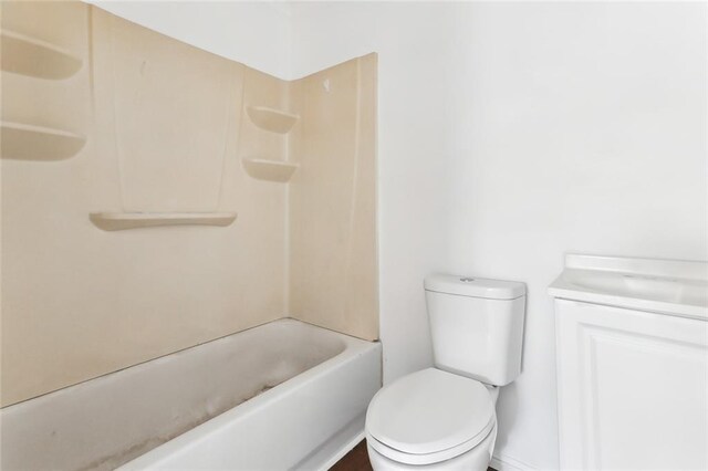 full bathroom featuring vanity, shower / bathtub combination, and toilet