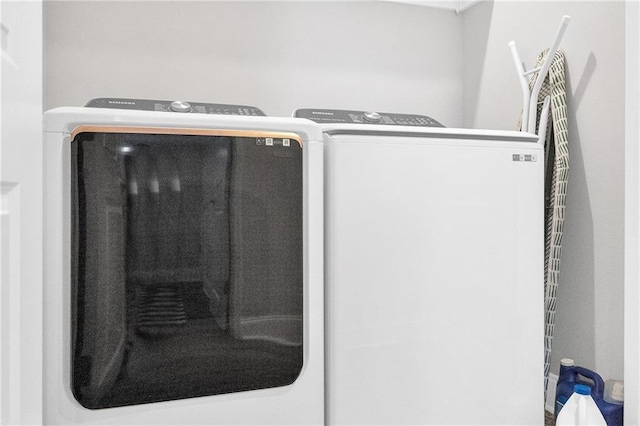 details featuring washing machine and clothes dryer