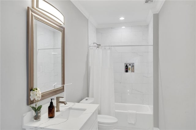 full bathroom featuring shower / bath combo, toilet, crown molding, and vanity