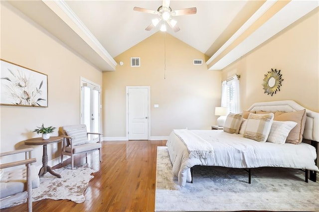 bedroom with hardwood / wood-style floors, crown molding, high vaulted ceiling, and ceiling fan