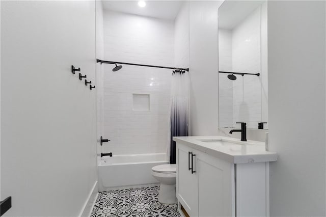 full bathroom featuring tile patterned flooring, vanity, toilet, and shower / bathtub combination with curtain