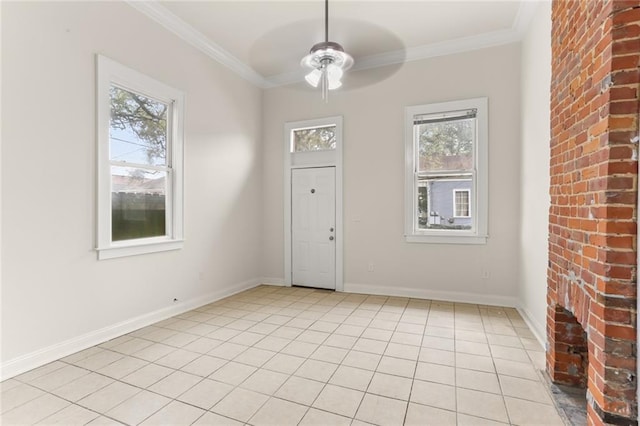 entryway with a fireplace, light tile patterned floors, ceiling fan, and ornamental molding