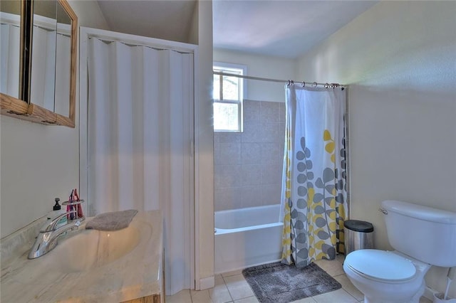 full bathroom with tile patterned flooring, toilet, shower / bath combo with shower curtain, and sink