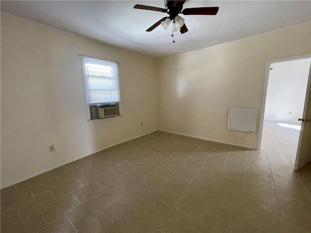 unfurnished room with ceiling fan and cooling unit