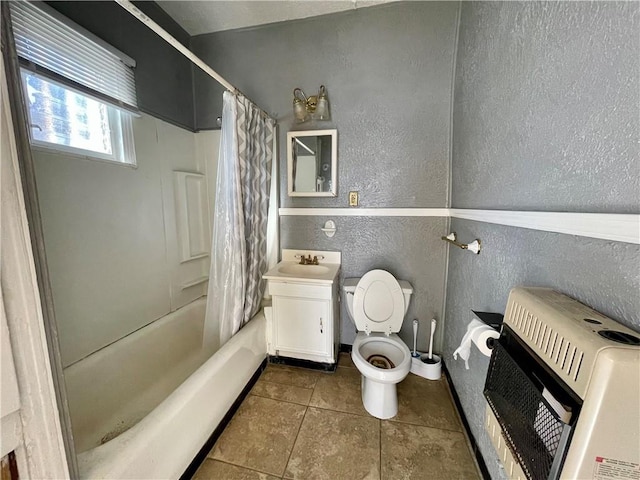 full bathroom featuring vanity, tile patterned floors, shower / bath combination with curtain, toilet, and heating unit