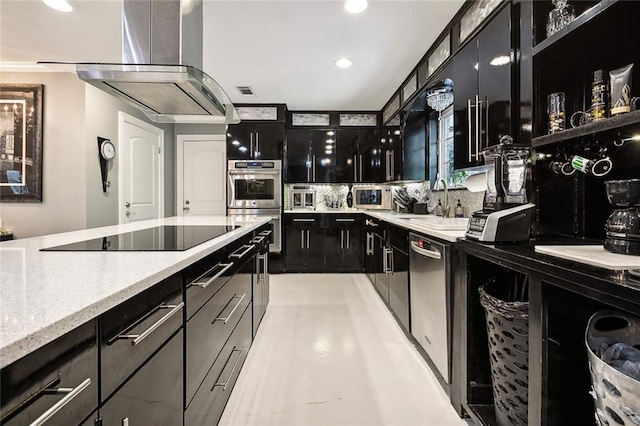 kitchen with sink, stainless steel appliances, light stone counters, extractor fan, and decorative backsplash