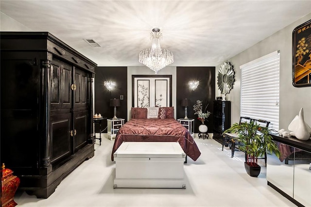 bedroom featuring an inviting chandelier