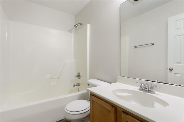 full bathroom with shower / tub combination, vanity, and toilet