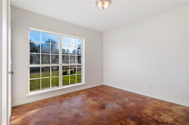 empty room featuring concrete flooring