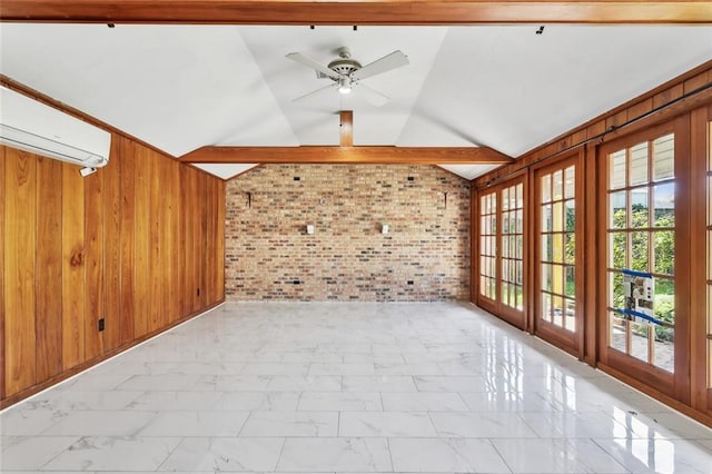 interior space with a wall mounted air conditioner, french doors, brick wall, lofted ceiling with beams, and wood walls