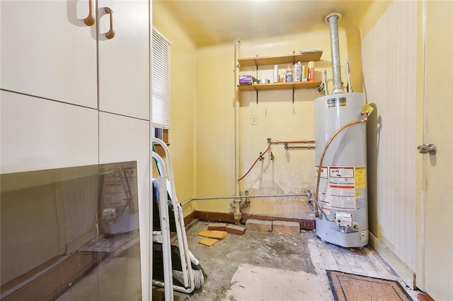 utility room featuring water heater