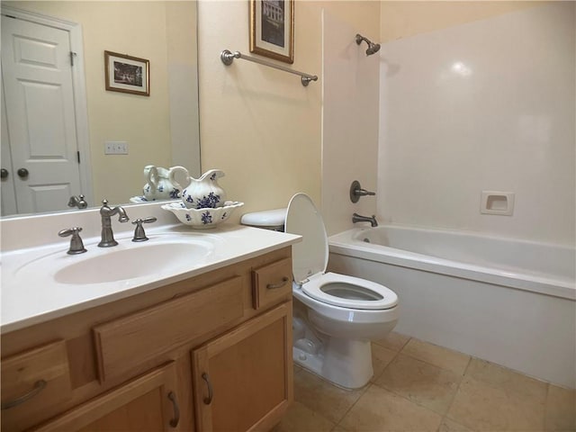 full bathroom with tile patterned flooring, vanity, washtub / shower combination, and toilet