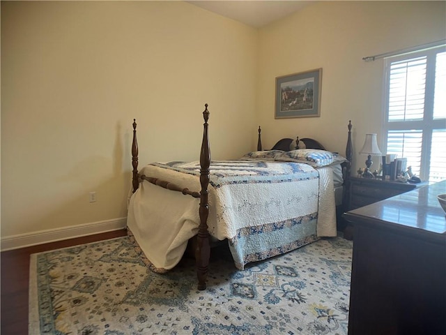 bedroom featuring wood-type flooring