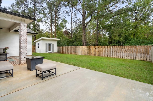 view of patio with an outdoor structure