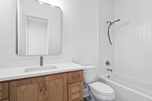 full bathroom with washtub / shower combination, vanity, and toilet