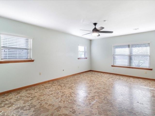 spare room featuring ceiling fan