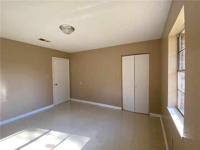 unfurnished bedroom featuring a closet