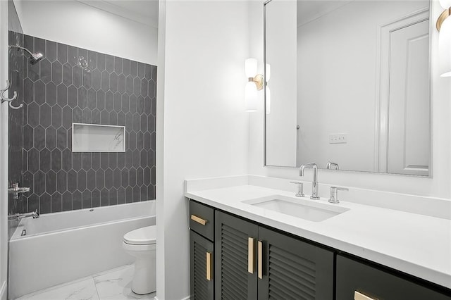 full bathroom with vanity, tiled shower / bath combo, and toilet