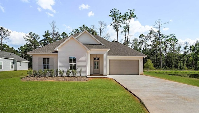 view of front of house with a front lawn and a garage