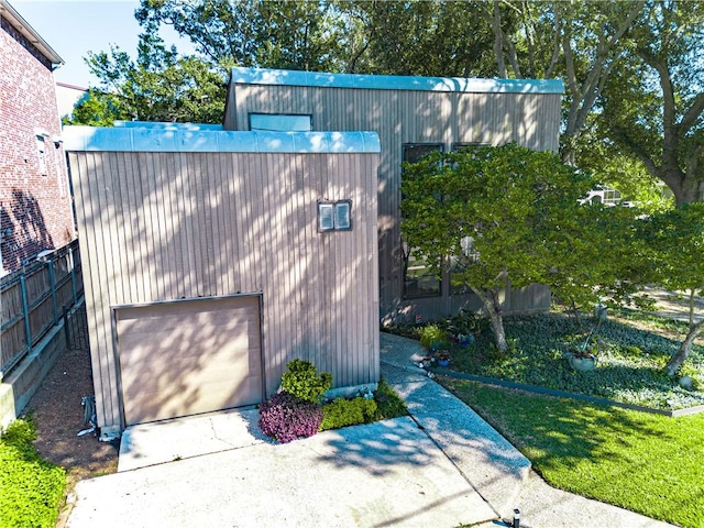 exterior space featuring a garage