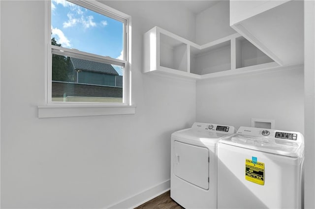 4313 Randolph Ave, New Orleans, LA 70122 - laundry room with washer and dryer, baseboards, and dark wood-style flooring