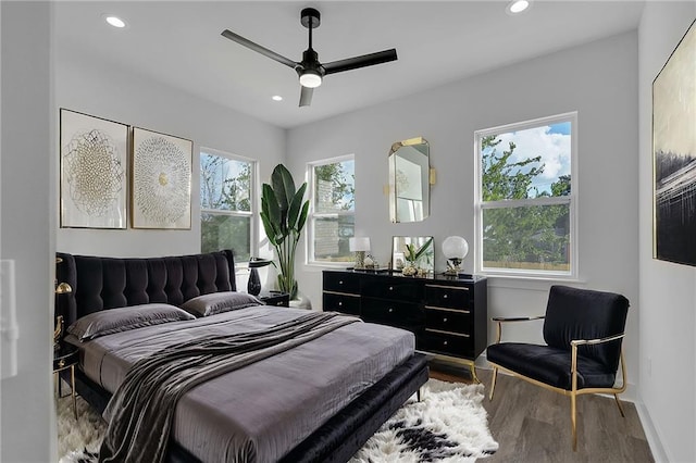4313 Randolph Ave, New Orleans, LA 70122 - bedroom with wood finished floors, recessed lighting, baseboards, and ceiling fan