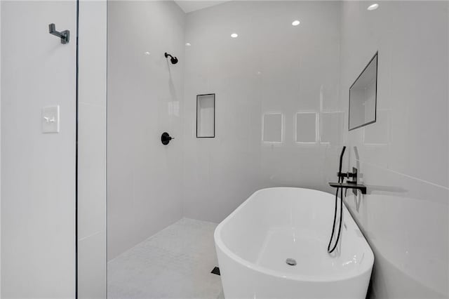4313 Randolph Ave, New Orleans, LA 70122 - bathroom with a freestanding bath and a tile shower