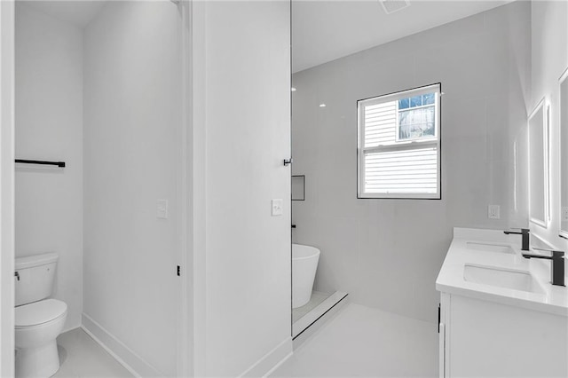 4313 Randolph Ave, New Orleans, LA 70122 - bathroom with toilet, double vanity, and a soaking tub