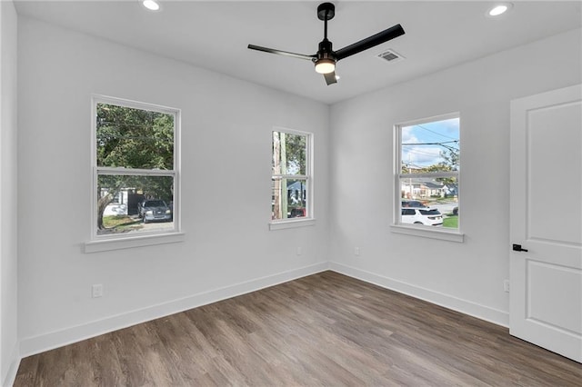 4313 Randolph Ave, New Orleans, LA 70122 - empty room with ceiling fan, healthy amount of natural light, recessed lighting, and wood finished floors