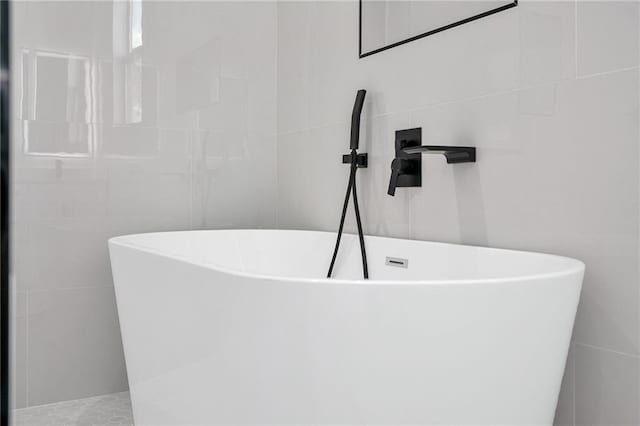 4313 Randolph Ave, New Orleans, LA 70122 - full bath with tile walls and a soaking tub