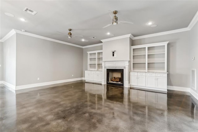 unfurnished living room featuring built in features, ceiling fan, and crown molding