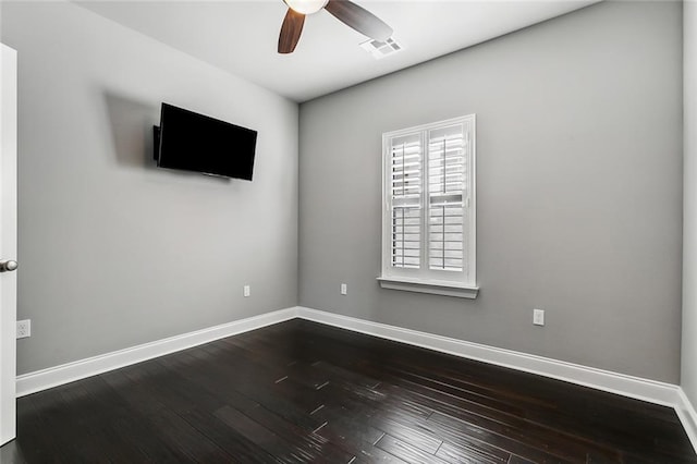 unfurnished room with ceiling fan and hardwood / wood-style flooring