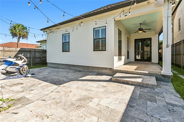 exterior space featuring ceiling fan and a patio