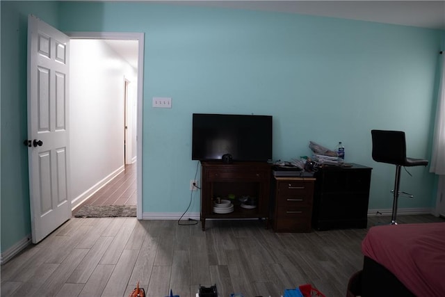 bedroom featuring hardwood / wood-style floors